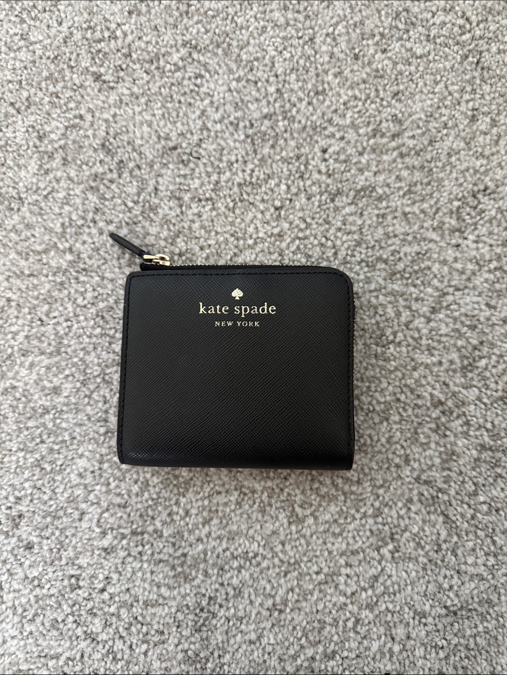 kate spade black Saffiano zip wallet with gold logo